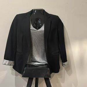 Blazer with silver sleeves, top is not included will come dry cleaned